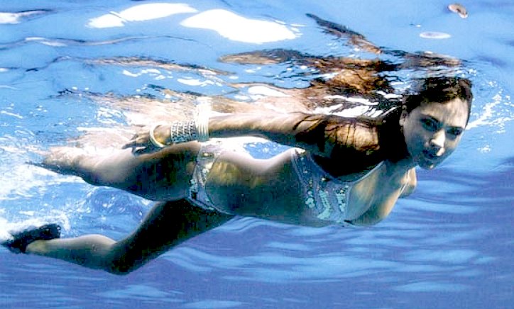 A very accomplished swimmer wearing a bikini