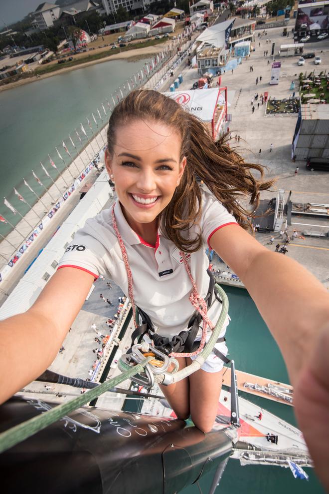 Miss World, Rolene Strauss, climbs the mast of the Dongfeng Volvo ocean racing yacht