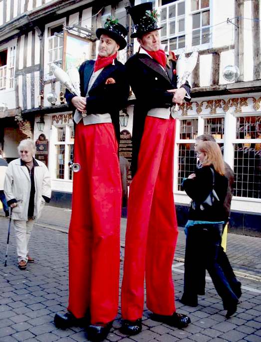 Stilt walkers street comedy acts